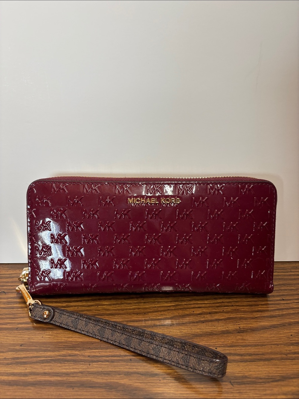Michael Kors Patent Embossed Wine Zip-Around Wallet Wristlet